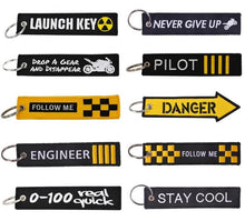 remove before flight keychain